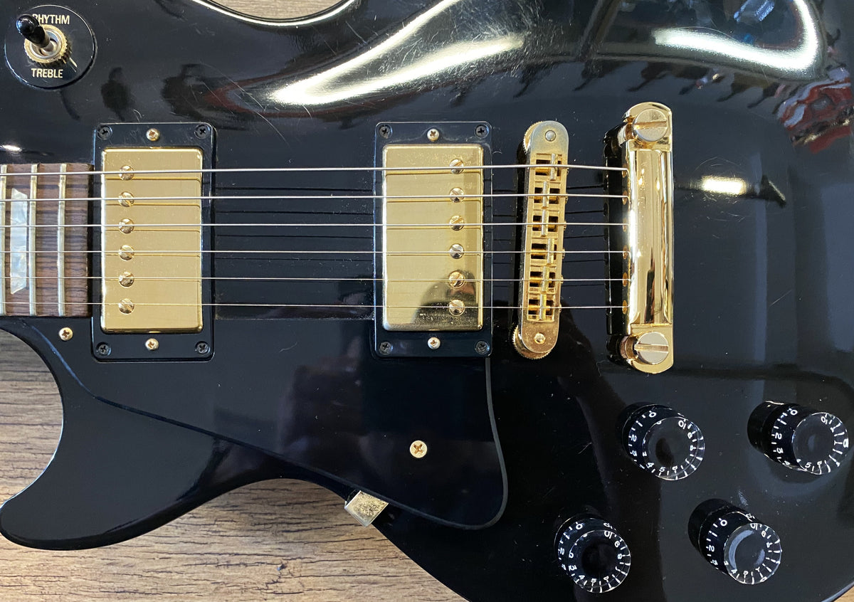 USED 2004 Gibson Les Paul Studio Gloss Ebony Finish Left-Handed Electric Guitar with Original Hardshell Case
